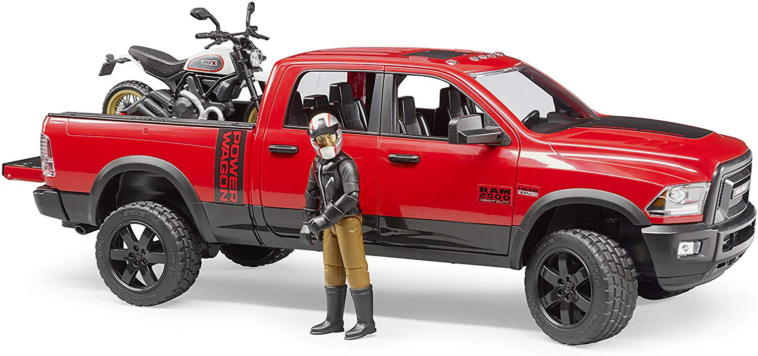 RAM 2500 Power Wagon with Ducati Scrambler Desert Sled and Driver - Image 2